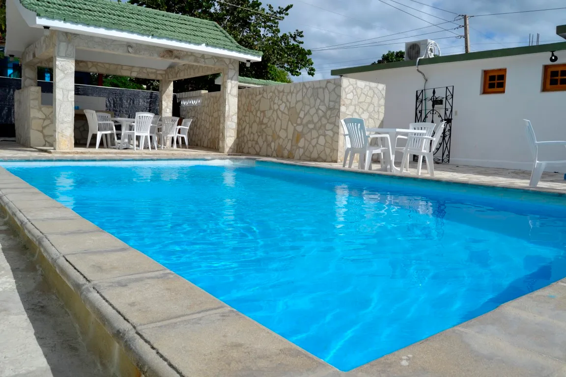 Casa Carlos y Orquídea, alojamiento con piscina cerca de la playa Copiar